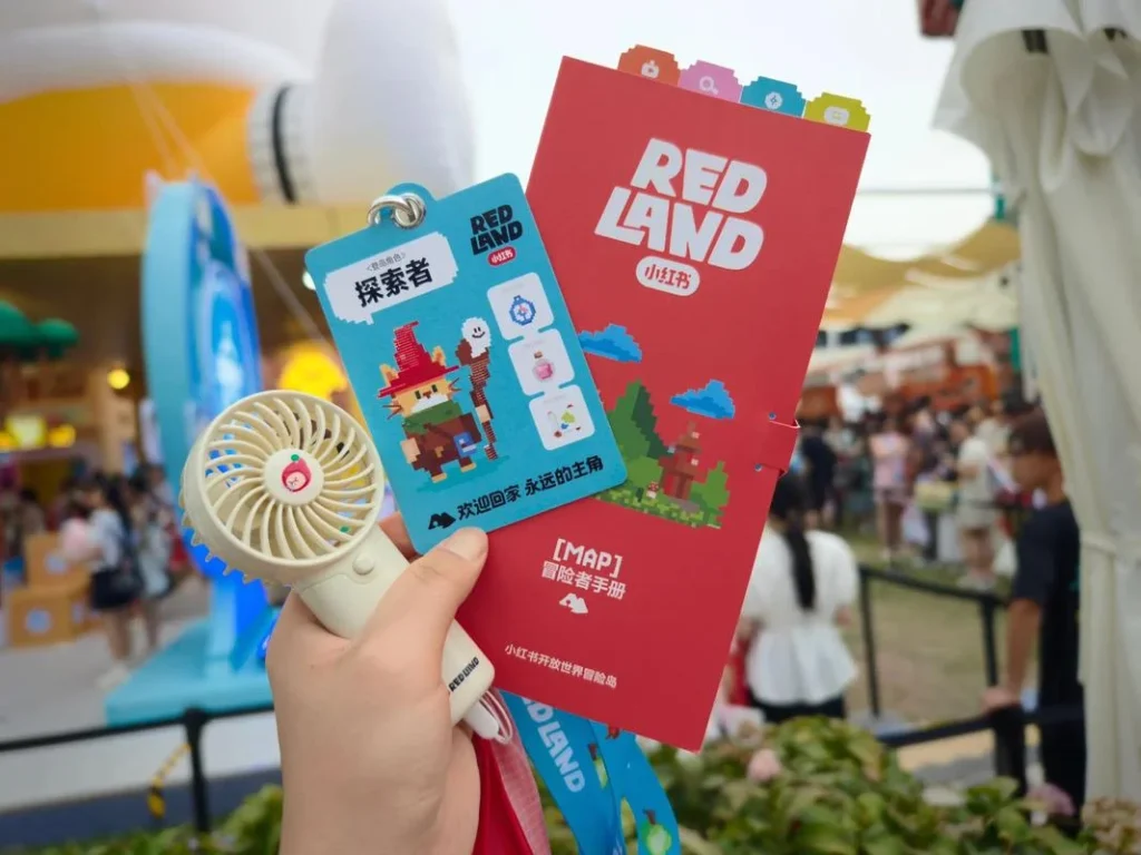 Xiaohongshu RedLand event tickets and merchandise highlighting brand community engagement and offline experience marketing