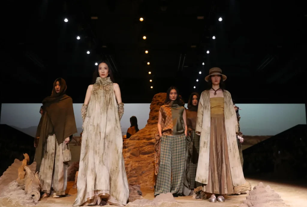 Chinese fashion runway featuring modern garments inspired by traditional aesthetics reflecting the rise of culture-driven consumption and Guochao design