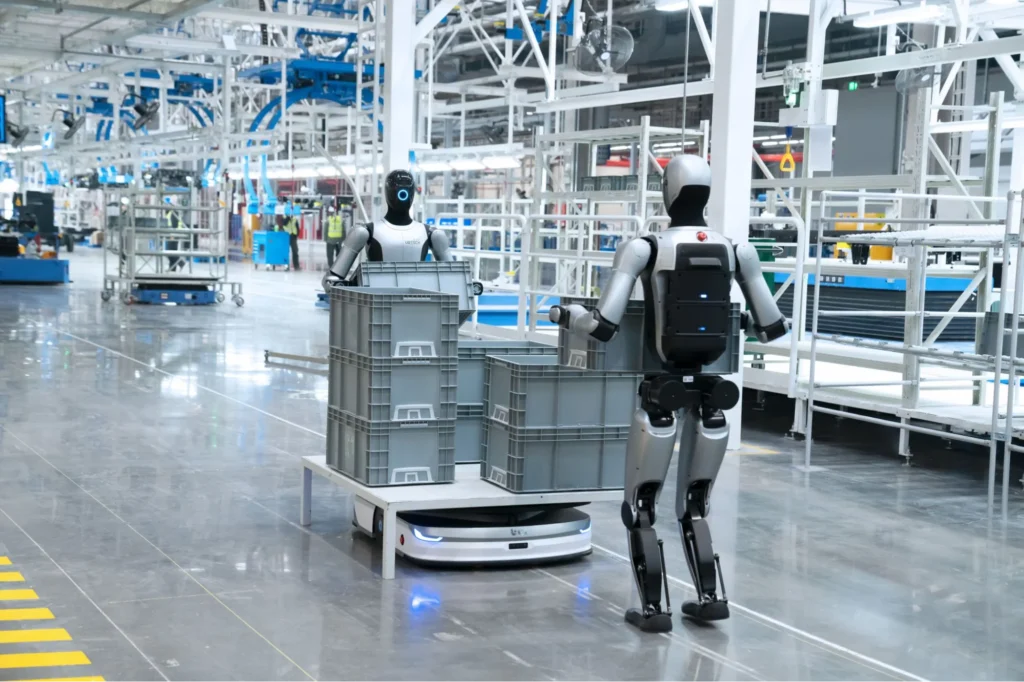UBTECH humanoid robots transporting crates in smart factory environment with autonomous mobile platform