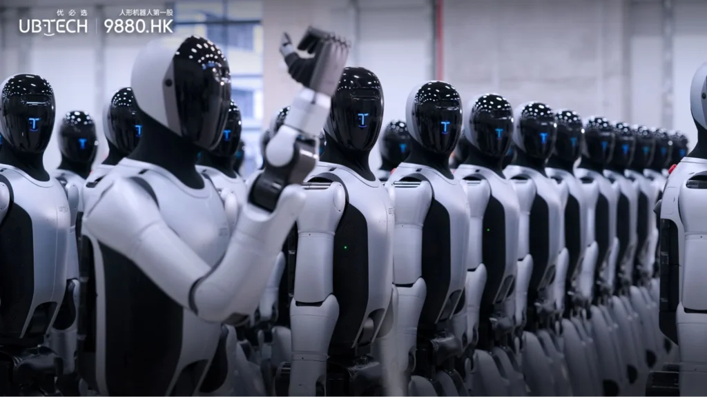 UBTECH humanoid robots lined up in production facility showing large-scale industrial deployment