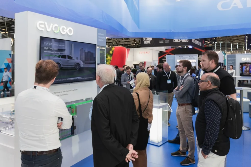 CATL EVOGO battery swapping system demonstration at tech exhibition showing electric vehicle energy solutions