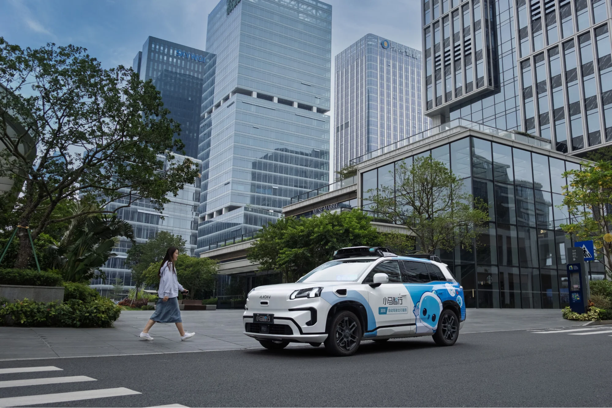 Pony AI autonomous vehicle driving in modern city environment demonstrating urban robotaxi deployment