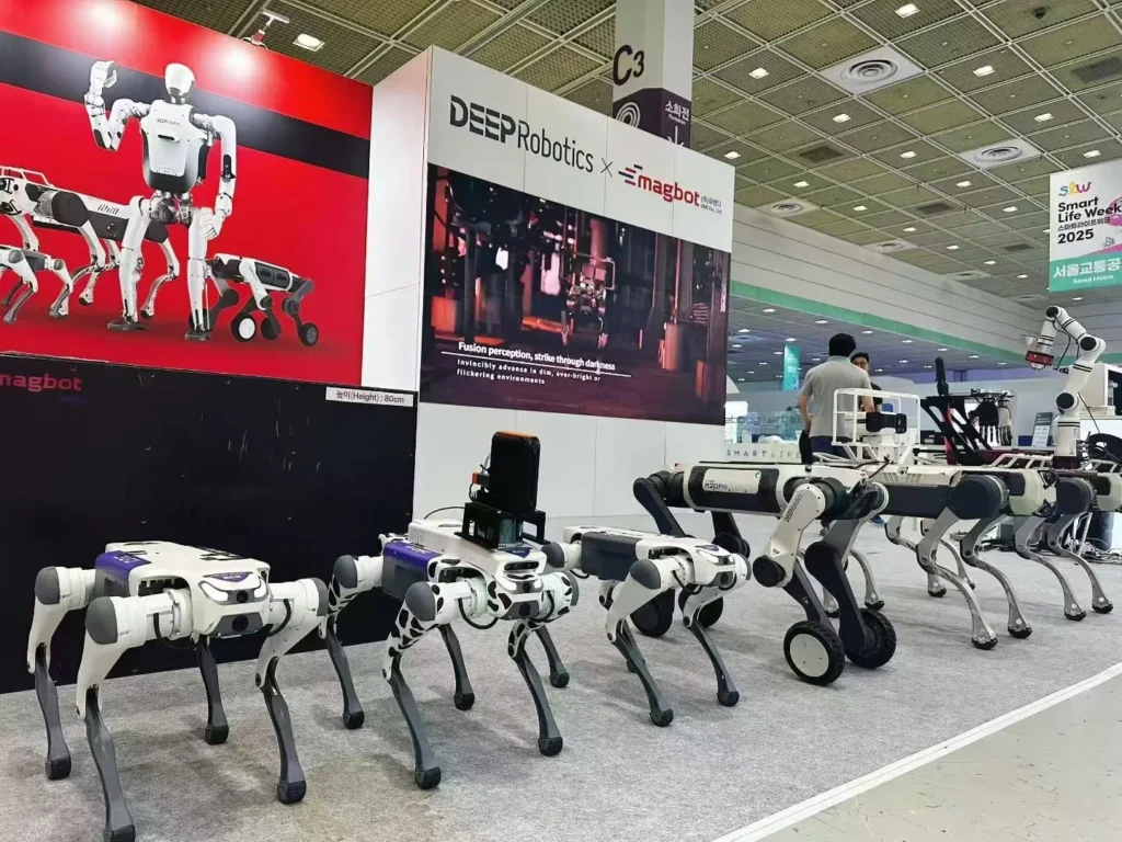 Quadruped robot dogs displayed at DEEP Robotics exhibition booth showcasing industrial robotics solutions