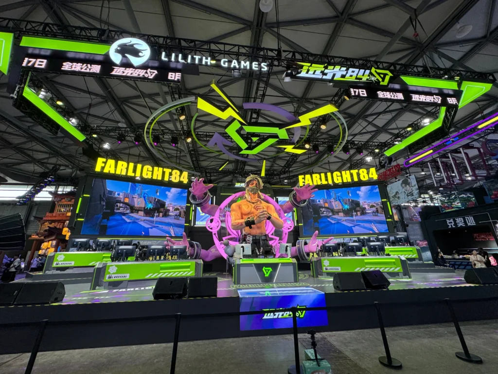 Farlight 84 game showcase booth at gaming expo with large stage and interactive displays
