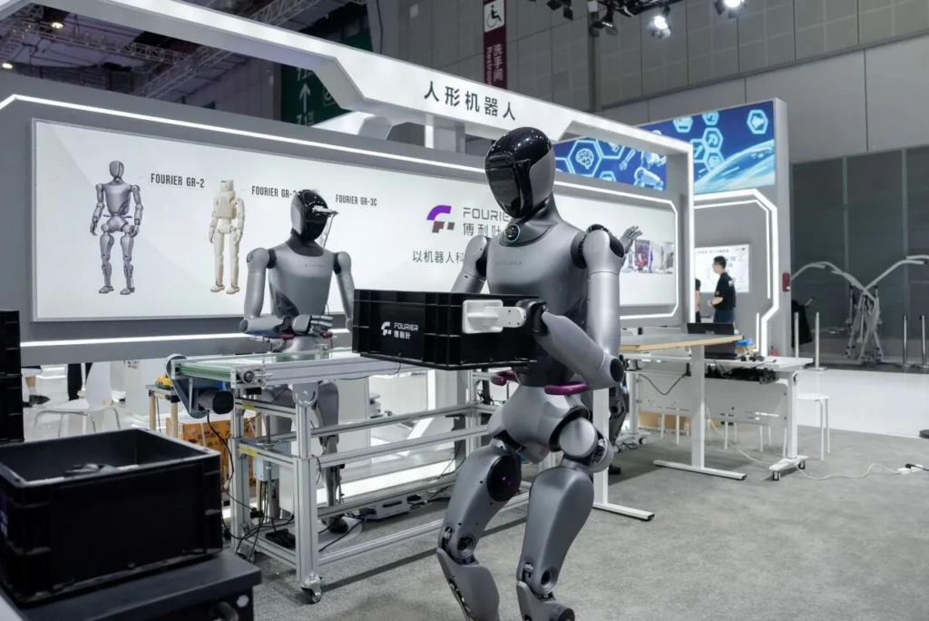 Fourier humanoid robots demonstrating industrial and logistics tasks.