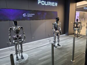 Fourier humanoid robots showcased at a robotics innovation center.
