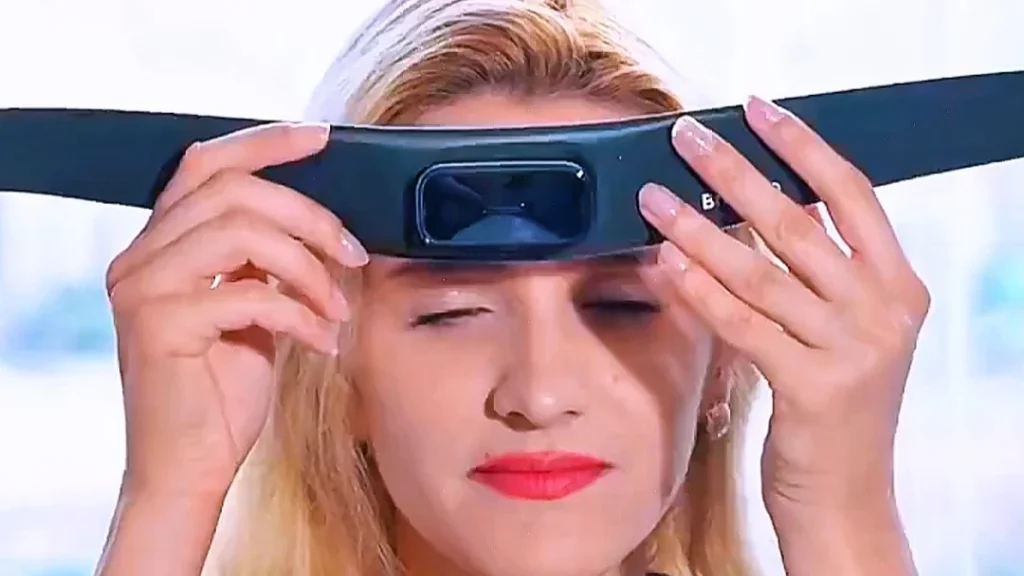 Woman adjusting BrainCo EEG headband device for brain-computer interface use