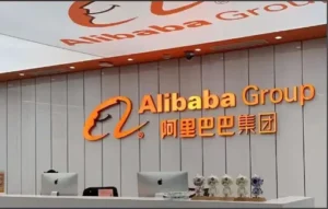 Alibaba Group office reception with company logo and Chinese branding displayed on wall