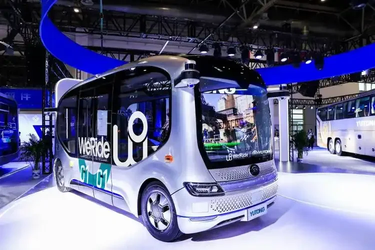 WeRide autonomous robobus displayed at tech exhibition showcasing driverless shuttle design