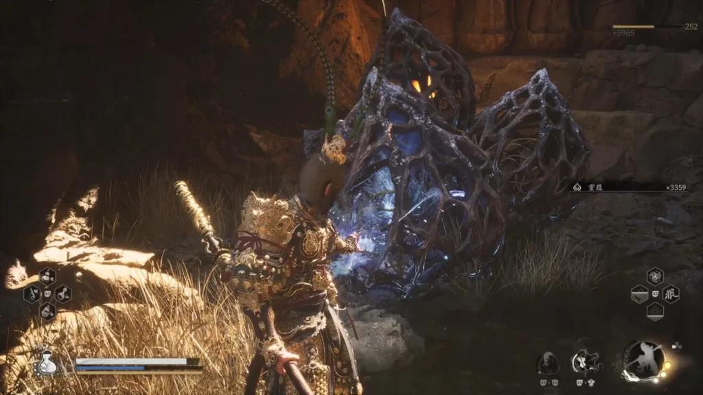 Black Myth Wukong gameplay showing Monkey King fighting a monster in a dark cave environment