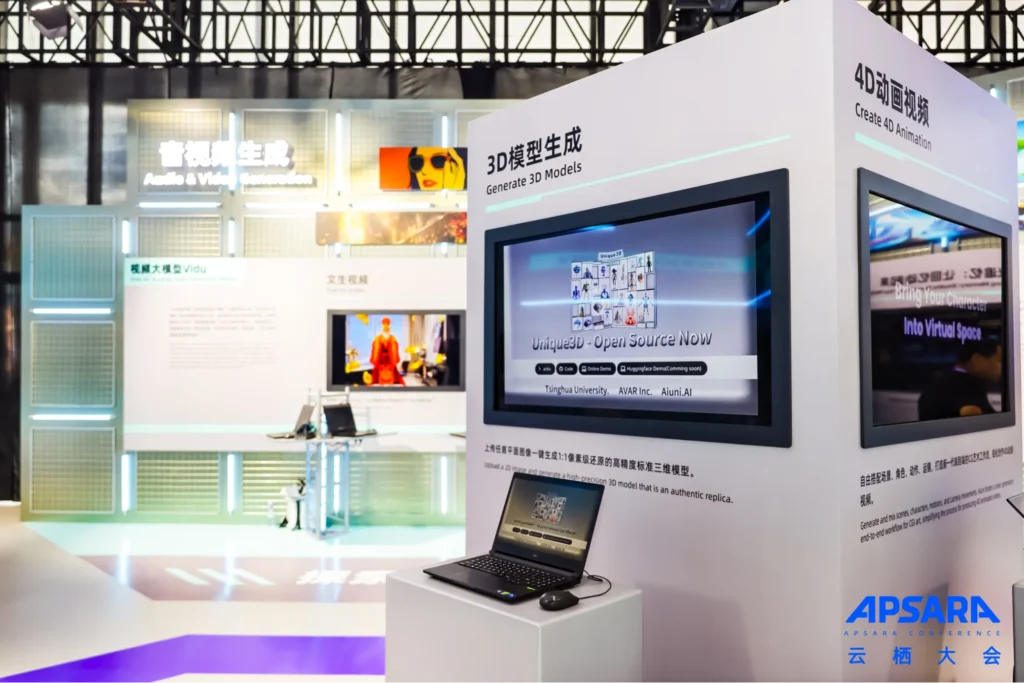 Alibaba Cloud booth demonstrating 3D model generation and AI video creation tools at tech event