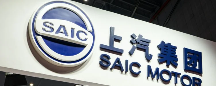 SAIC Motor company logo and branding display at an auto industry event