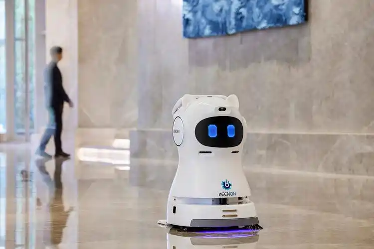 Cleaning robot navigating a commercial lobby floor independently
