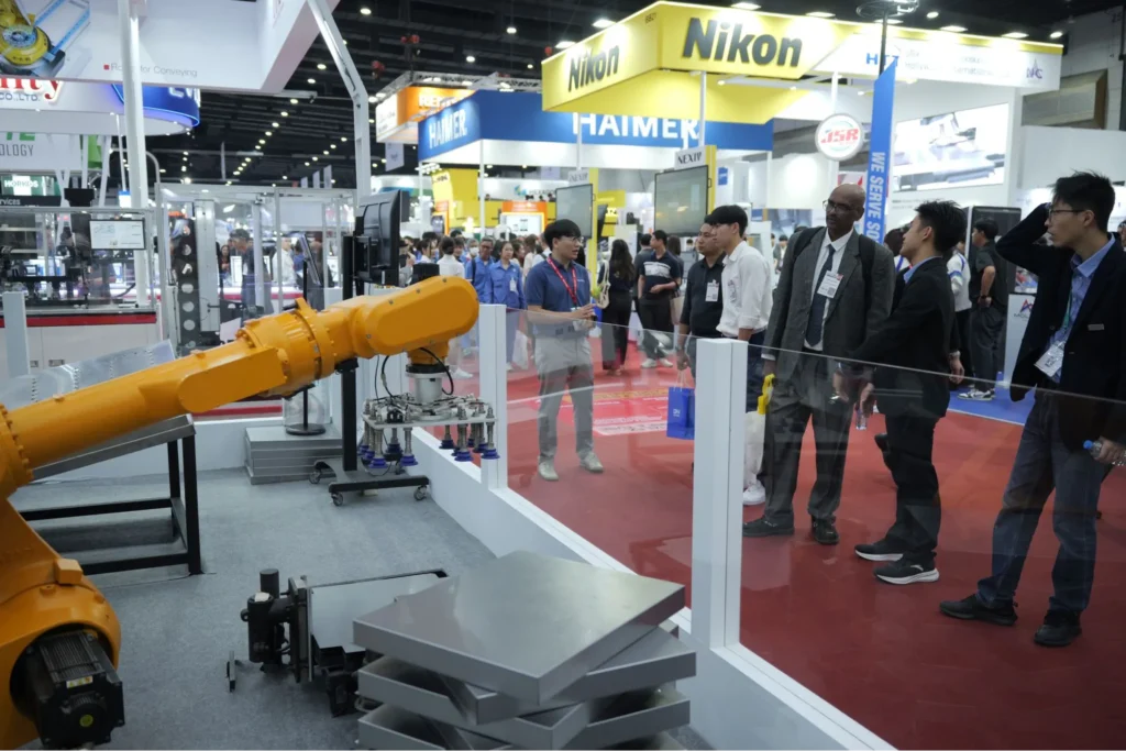 Visitors viewing Estun robotic automation solutions at an expo