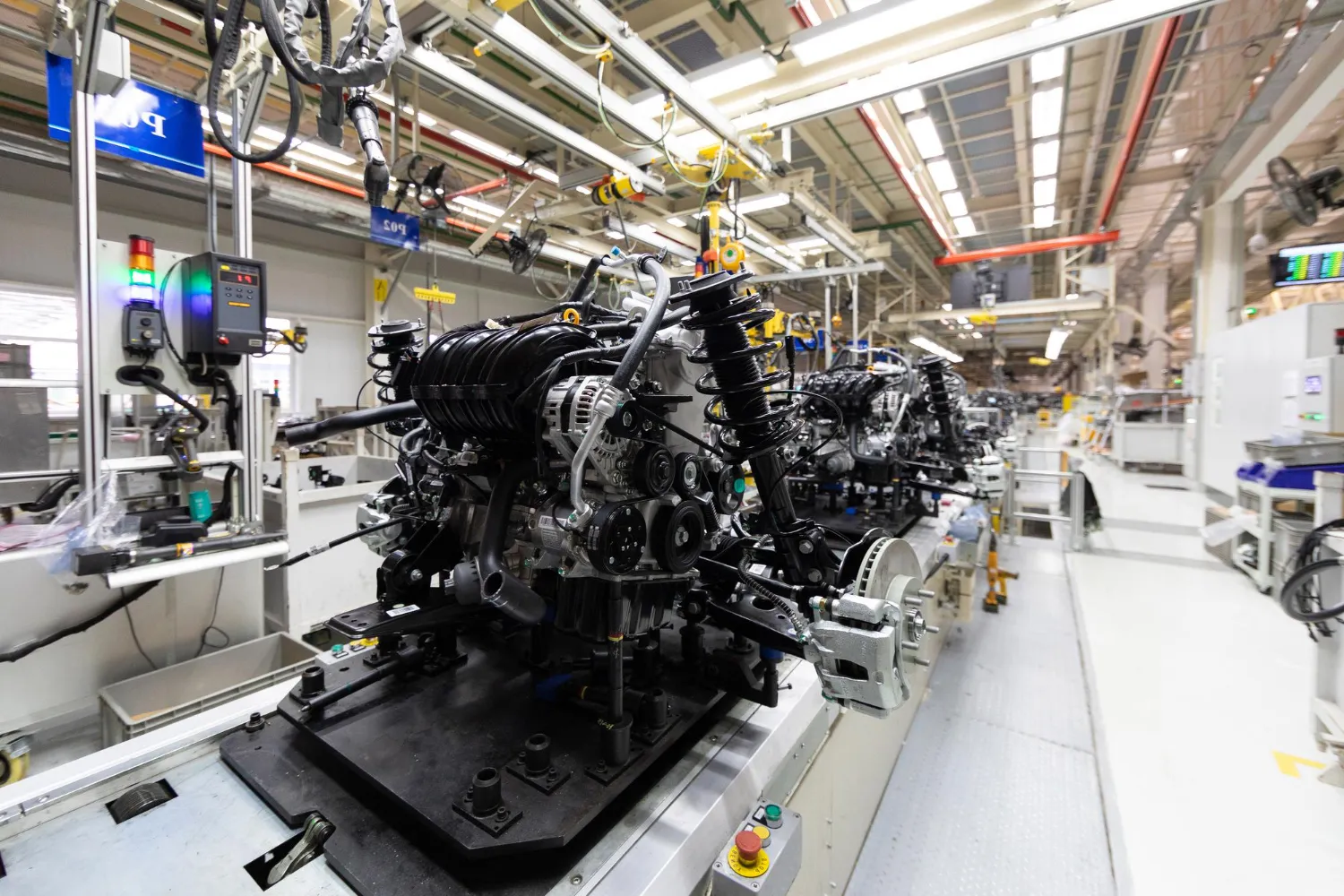 Automotive production line with robotic assembly systems
