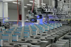 Automated battery cell production line inside a clean factory.
