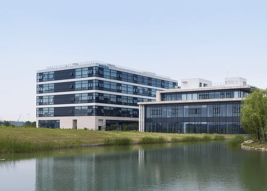 Modern BioBAY Suzhou buildings beside lake