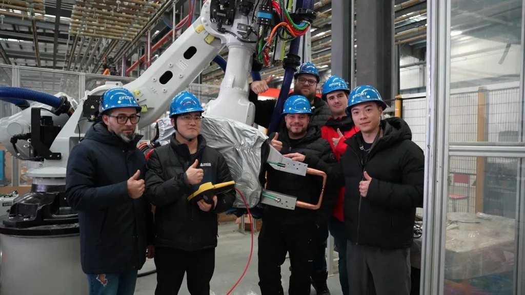 EFORT robotics team with industrial robot