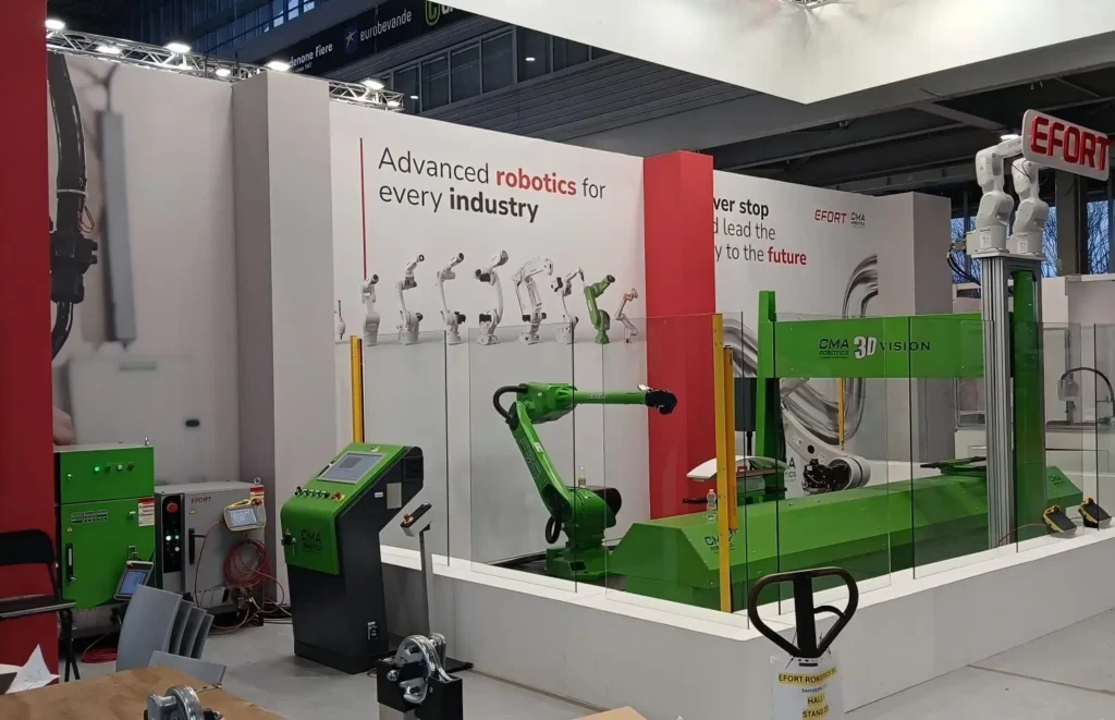EFORT robotics exhibition booth showcasing green industrial robotic arms and automation systems.
