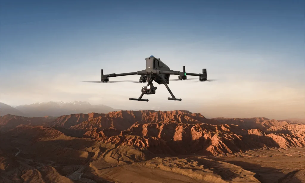 Industrial drone flying over desert mountains