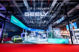 Geely auto show booth featuring new energy vehicles and smart mobility technology displays