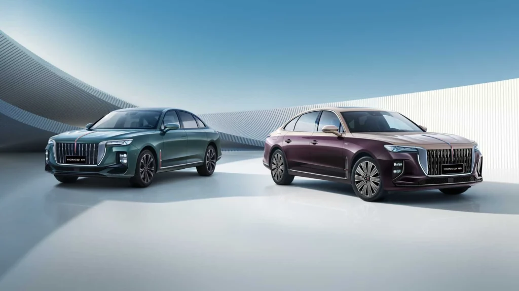 Two Hongqi luxury sedans displayed in a clean studio environment with modern lighting.