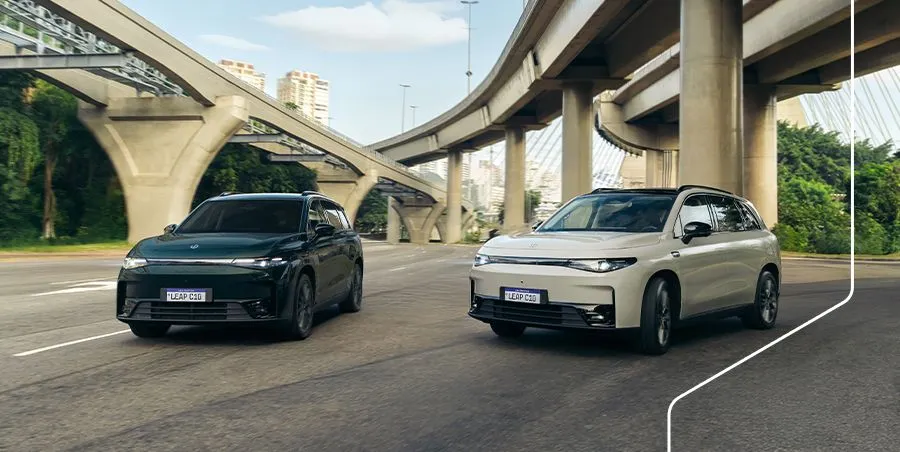 Two Leapmotor C10 electric SUVs driving on a city highway