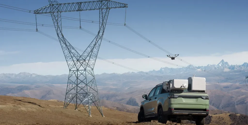 Drone inspecting power lines from mobile dock