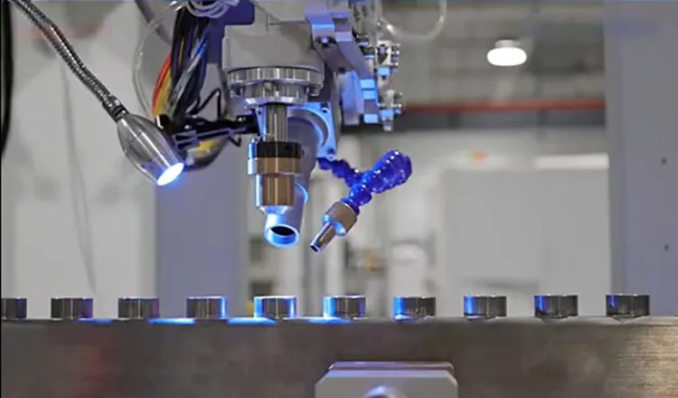 Industrial robotic arm performing precision machining on metal components in a factory setup.