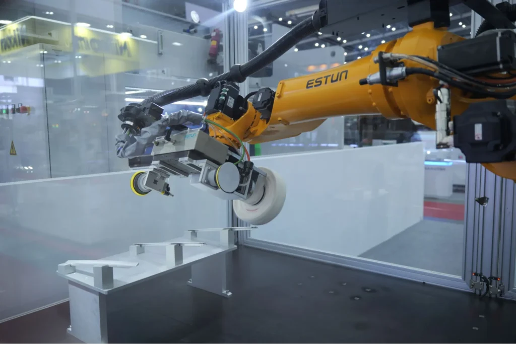 Estun industrial robot performing automated polishing operation