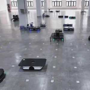 Mobile robots moving across a warehouse floor