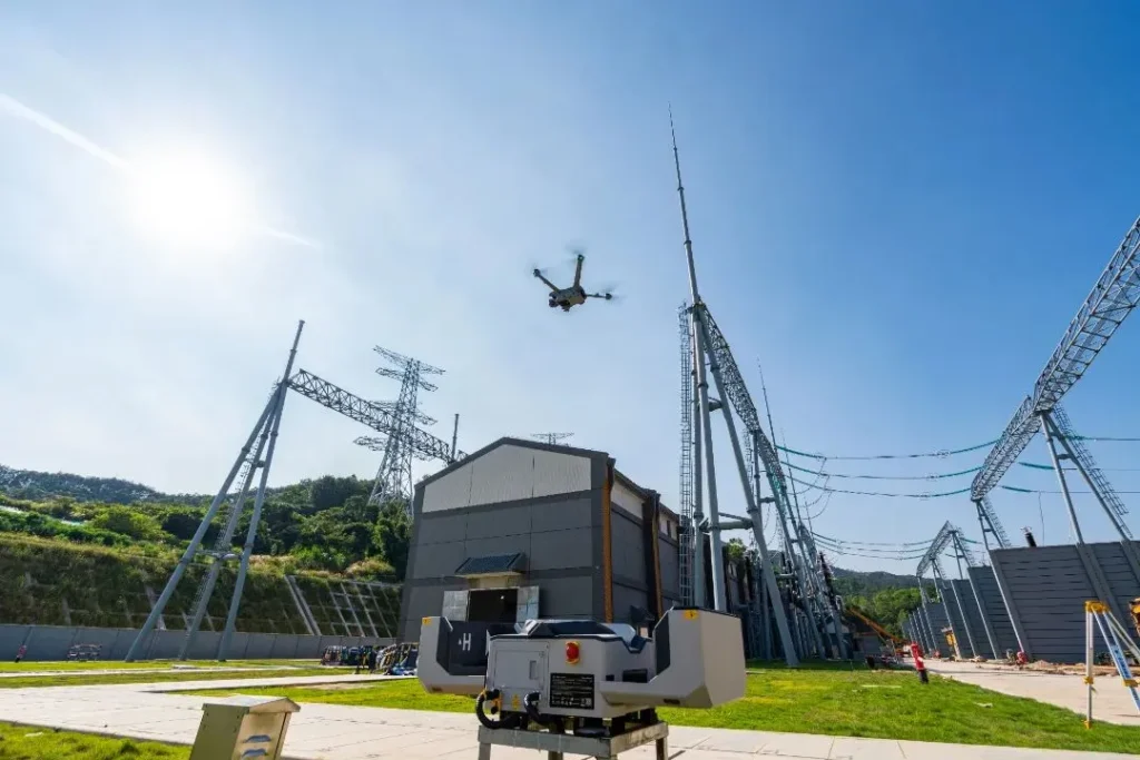 Drone inspecting power grid equipment