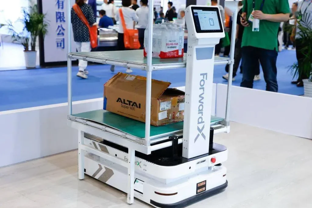ForwardX robot carrying goods at an expo