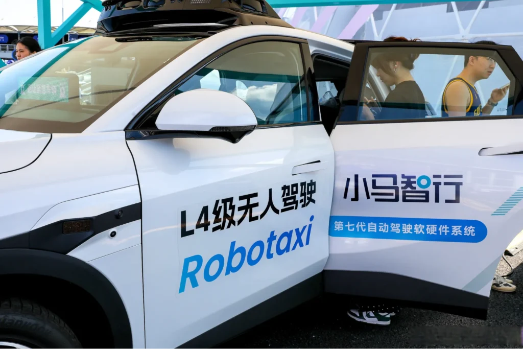 Robotaxi displayed in Guangzhou China with L4 autonomous driving text
