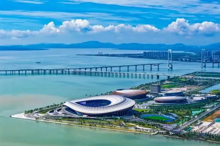 Aerial view of Guangzhou China stadium, bridge, and waterfront
