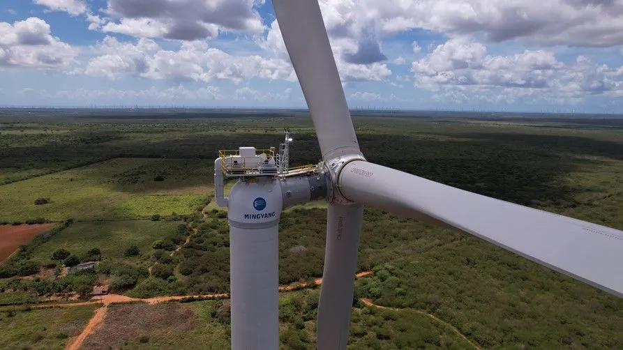 Mingyang wind turbine installed over a wide green landscape