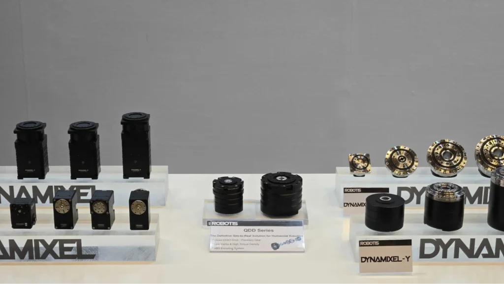 Robot actuators and joint modules displayed on a table