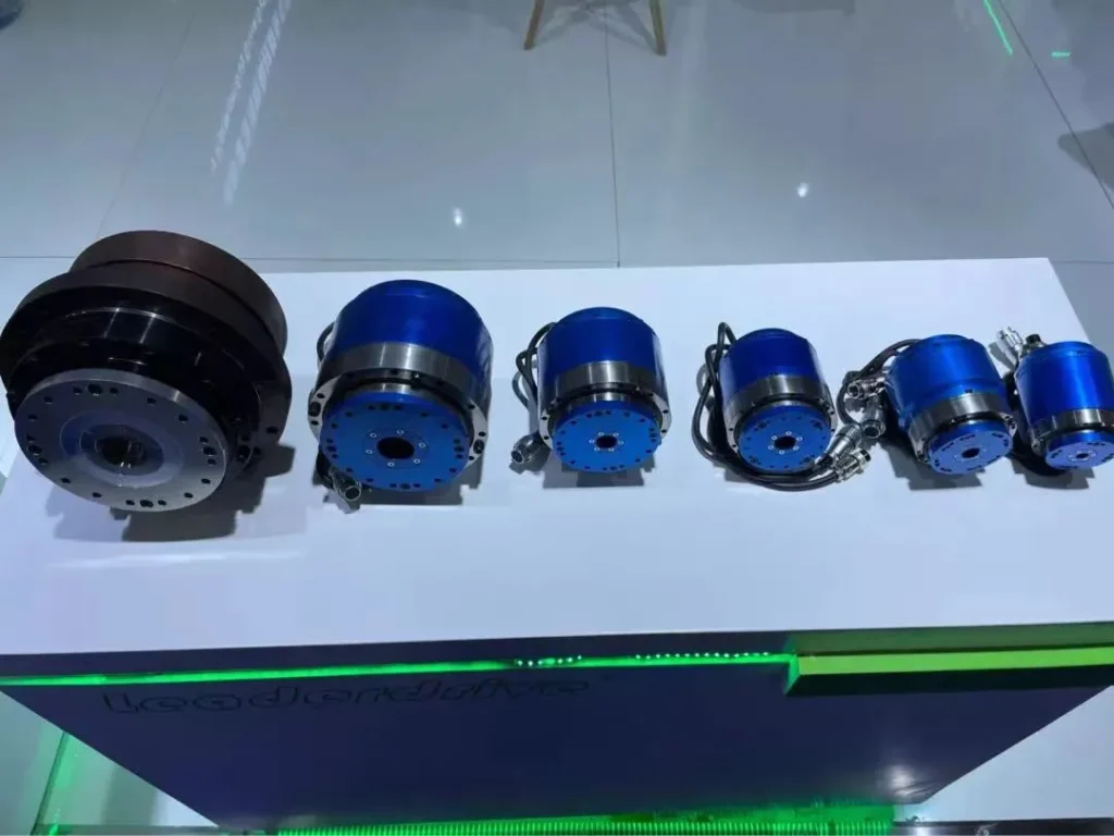 Blue robot joint actuators arranged by size
