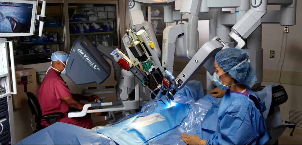 Surgeons using a robotic surgical system in an operating room.