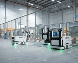 Arvato warehouse robots operating in a logistics facility