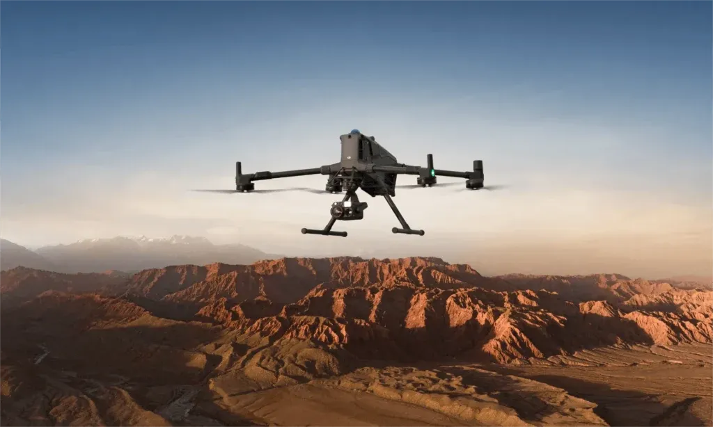 Worker loading boxes onto cargo drone