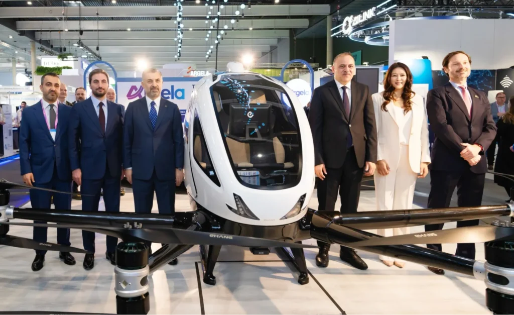 EHang aircraft displayed with officials at an expo