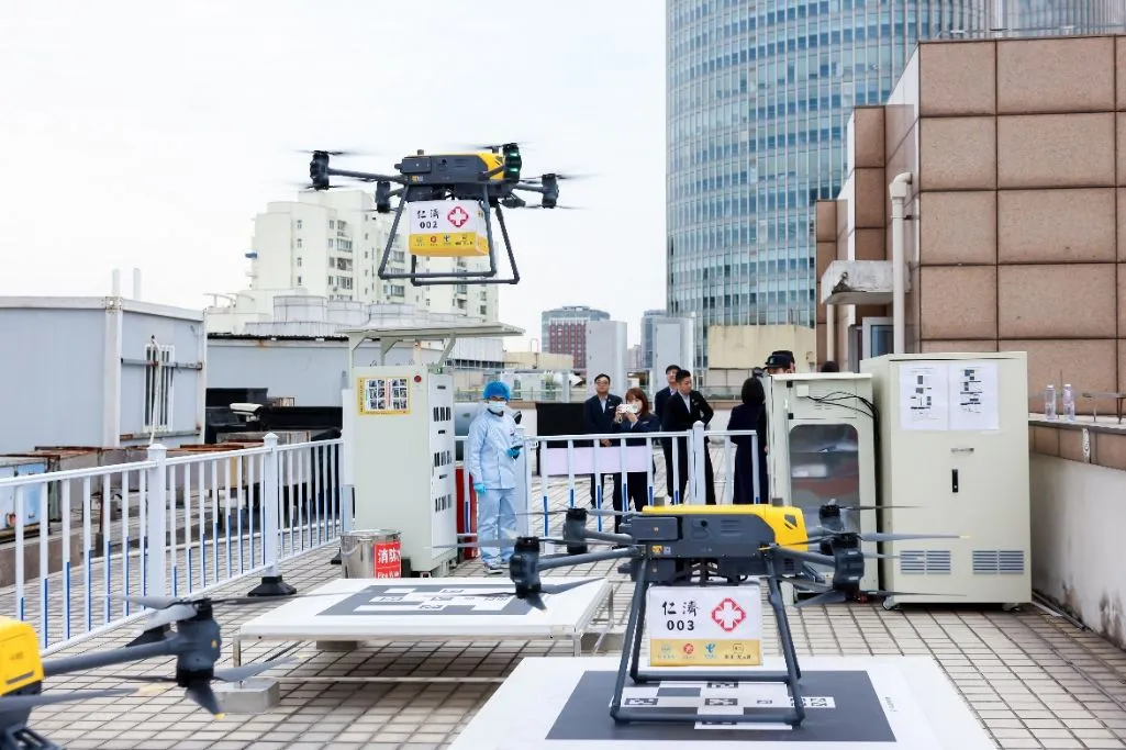 Medical delivery drones on hospital rooftop
