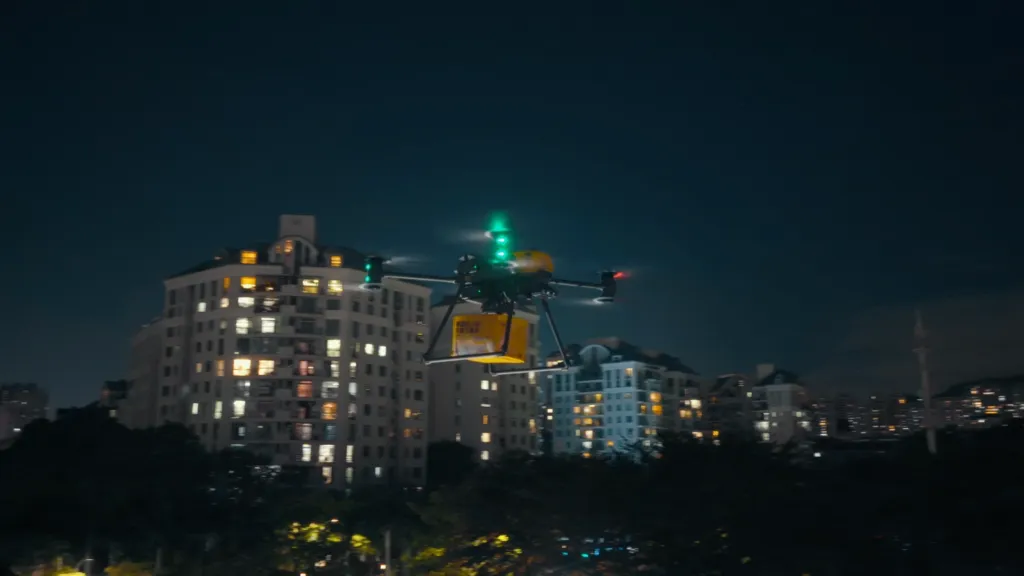 Delivery drone flying at night over city