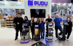 Pudu Robotics team at trade booth