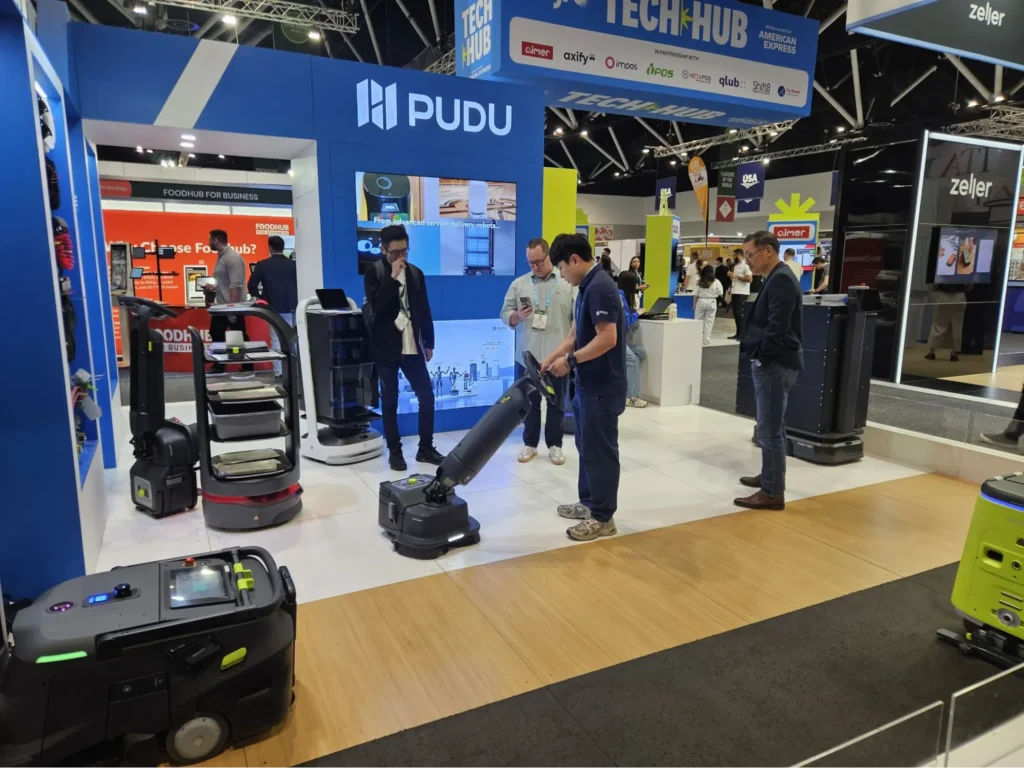 Pudu cleaning robots displayed at tech expo