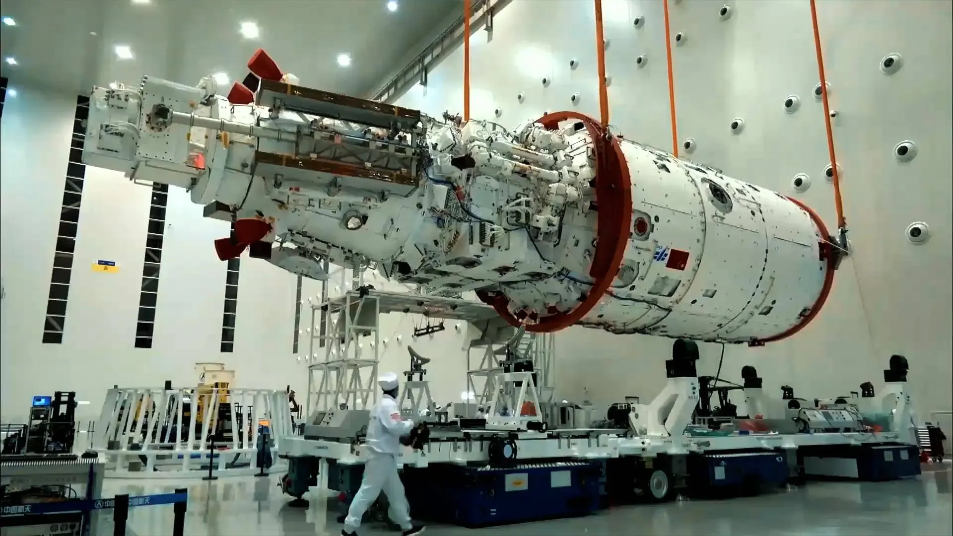 Chinese spacecraft undergoing indoor assembly