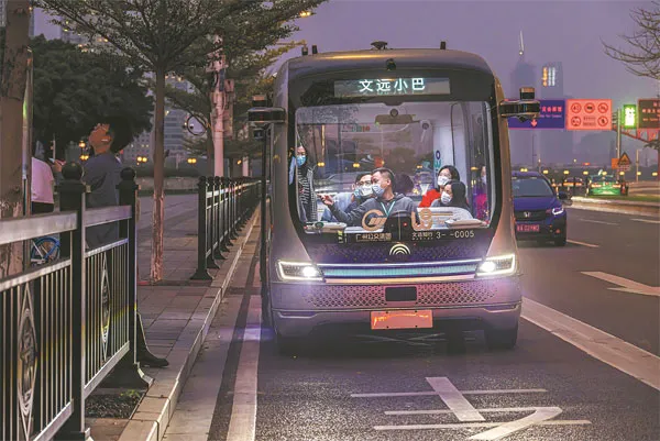 Driverless shuttle carrying passengers at night