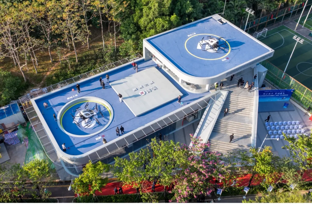 Rooftop vertiport with two eVTOL aircraft on landing pads
