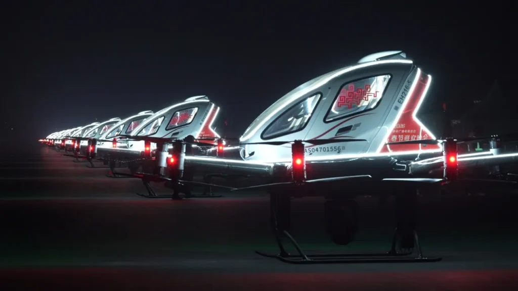 eVTOL aircraft lineup displayed at night